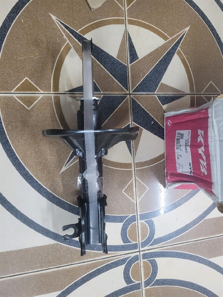 Phuộc nhún trước Mazda 626a