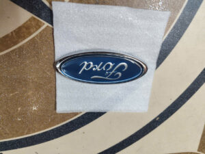 Logo cốp hậu Ford Laser